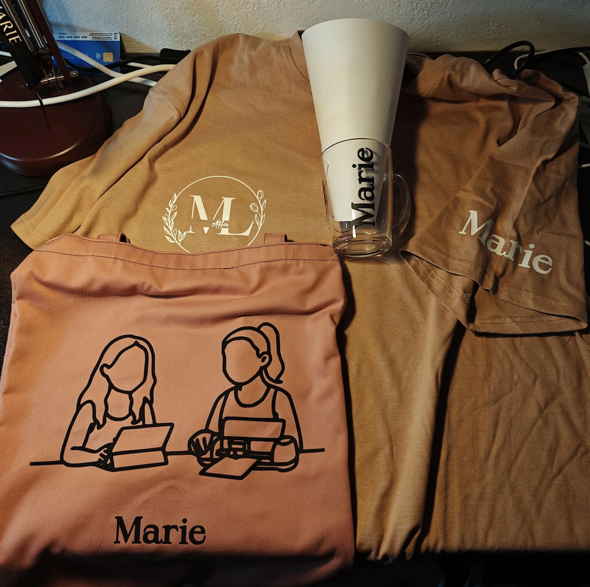 kleding bedrukt naam logo gepersonaliseerd